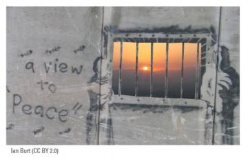 A view to peace, seen from a barred window